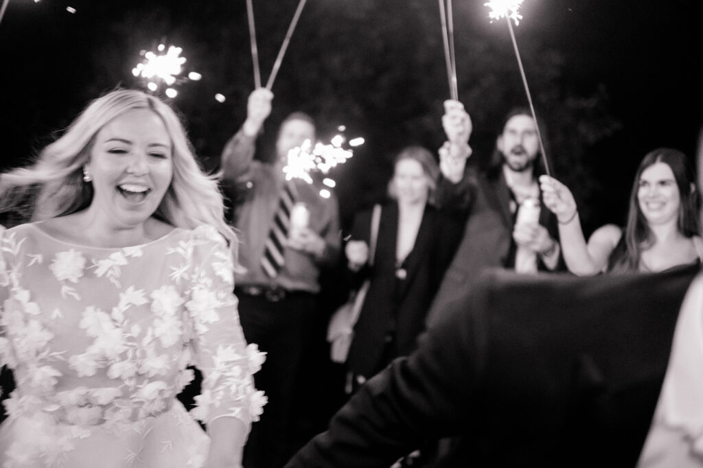 black and white wedding photo of sparklers 