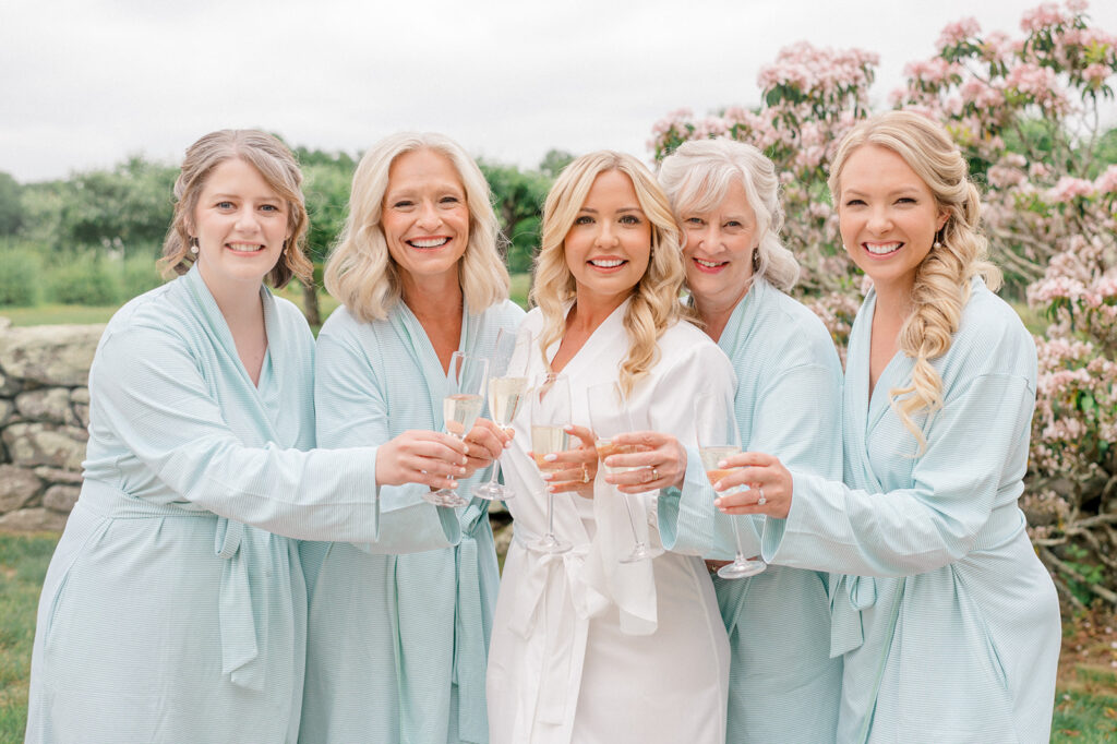 bridesmaids with bride getting ready garden wedding