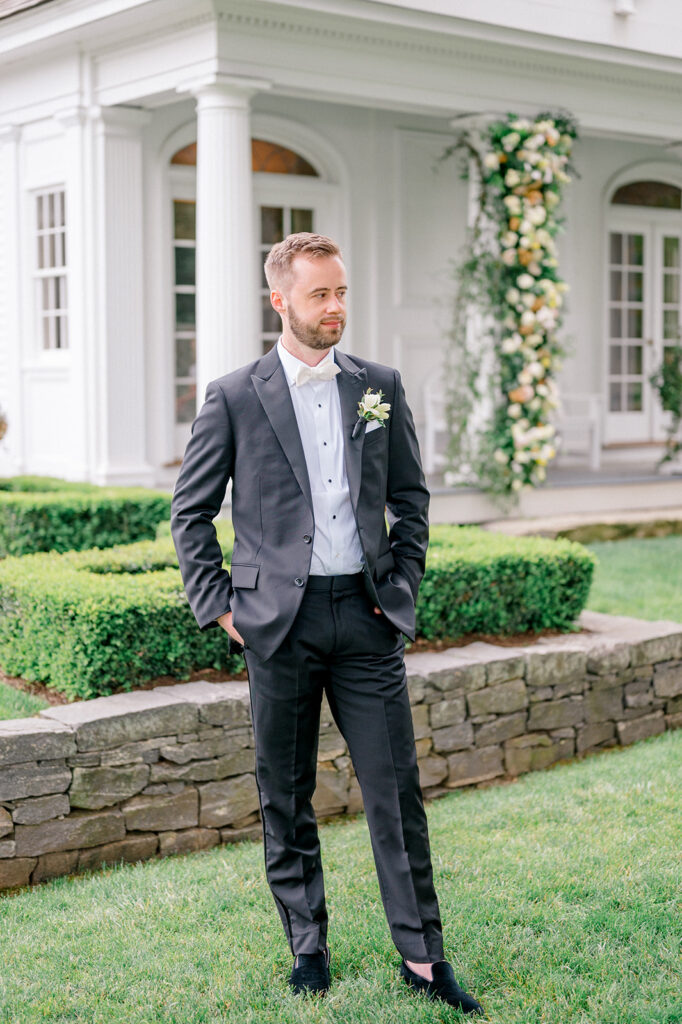 handsome groom garden wedding