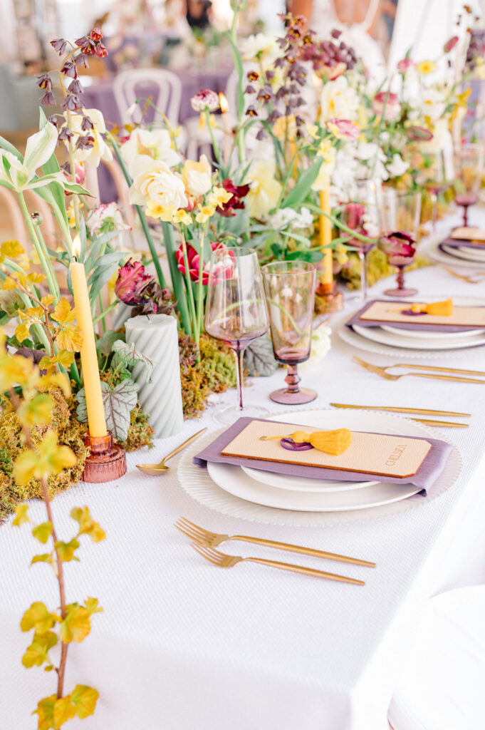 yellow and purple wedding reception table