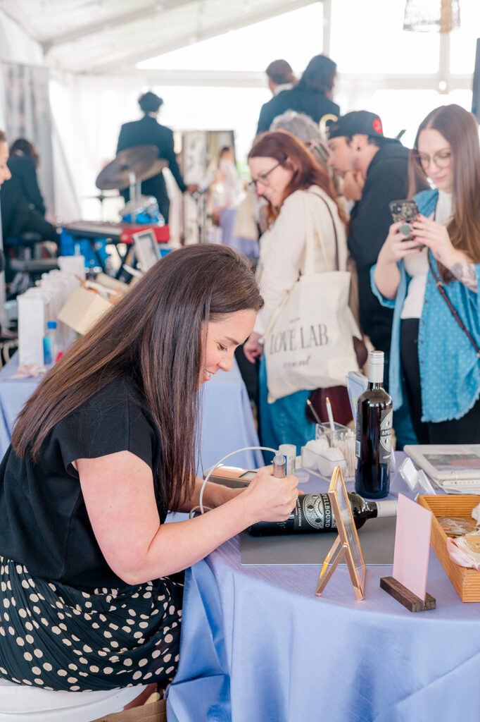 live calligraphy at a wedding is one of the biggest 2025 wedding trends