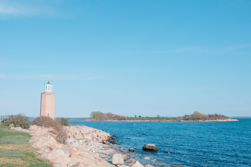 brandford house in CT waterfront with lighthouse in the background