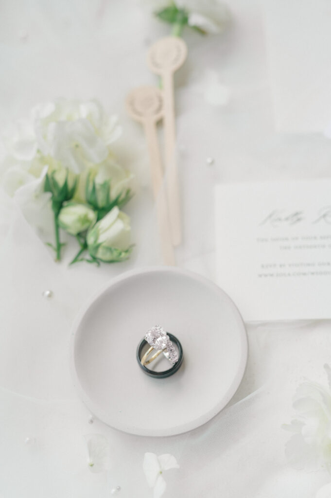 Detail shot of rings before wedding at Ritz Carlton Amelia Island. 