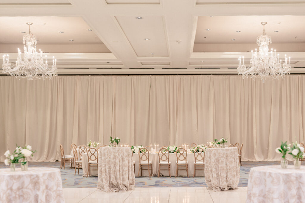 Wedding reception head table setting in ballroom of the Ritz Carlton Amelia. 