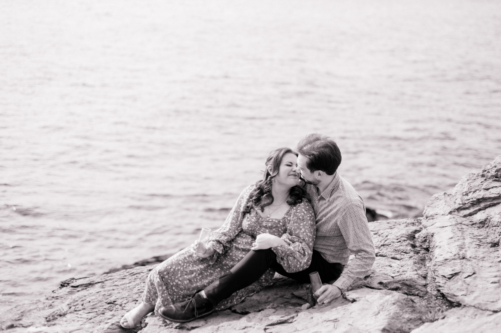 black and white couple by the seaside