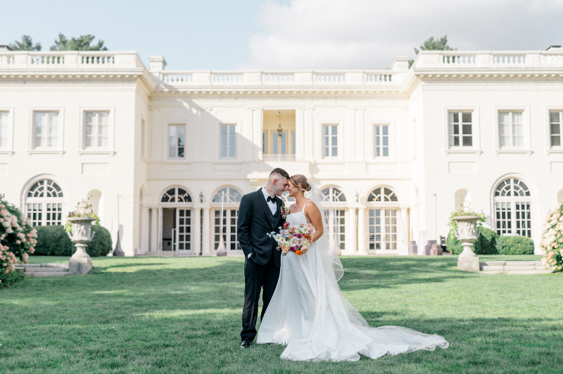 Bride and Groom standing in front of the Wadsworth Mansion