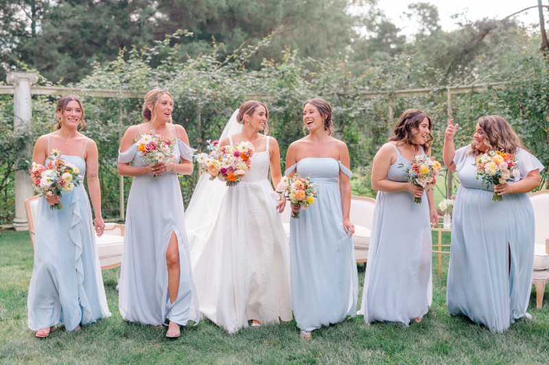 Bride with her bridesmaids and their perfectly coordinated look 