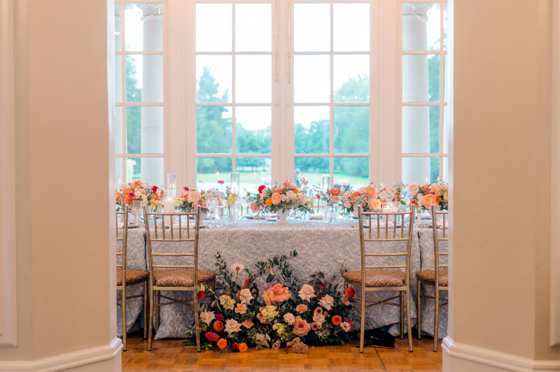 Lush florals and tasteful tablescapes over-looking the garden at the wedding at Wadsworth Mansion 